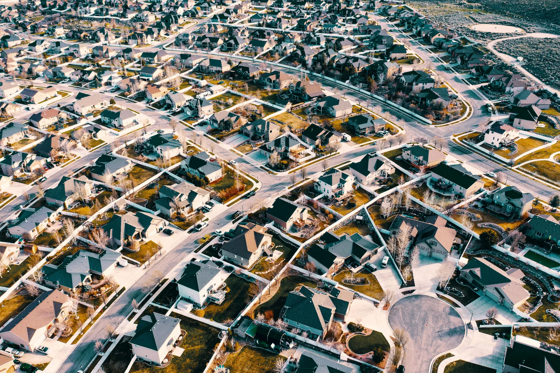 Illustrative aerial neighborhood view representing Utah residential communities